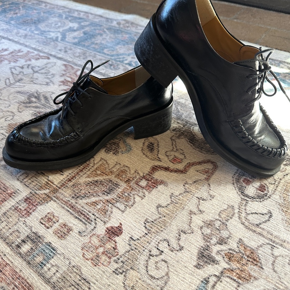 Reike Nen Black Leather Flats with Sturdy Sole and Glossy Finish
